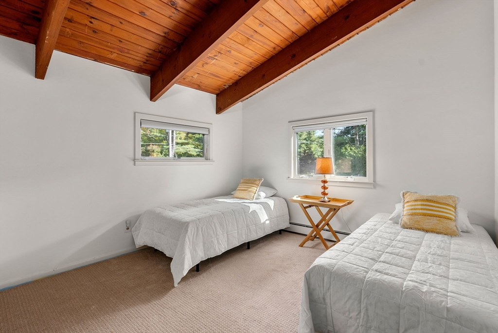 148 Oxbow Road Wayland, MA 01778 - Photo 20 of 32 a bedroom with 2 bed and a window