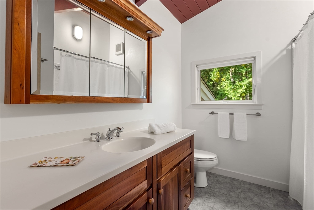 148 Oxbow Road Wayland, MA 01778 - Photo 22 of 32 a bathroom with a sink and a toilet