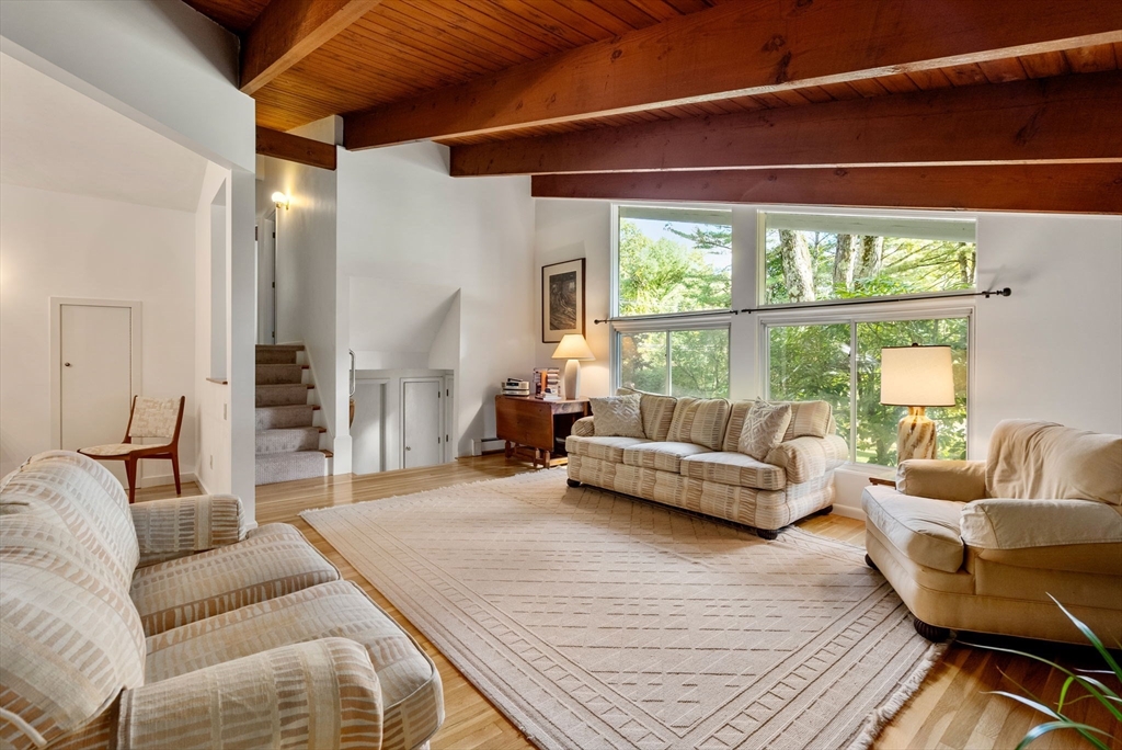 148 Oxbow Road Wayland, MA 01778 - Photo 3 of 32 a living room with furniture and a large window