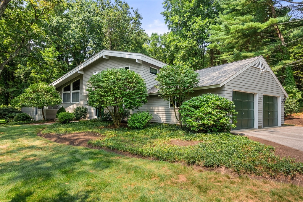 148 Oxbow Road Wayland, MA 01778 - Photo 32 of 32 a view of a house with yard and plants