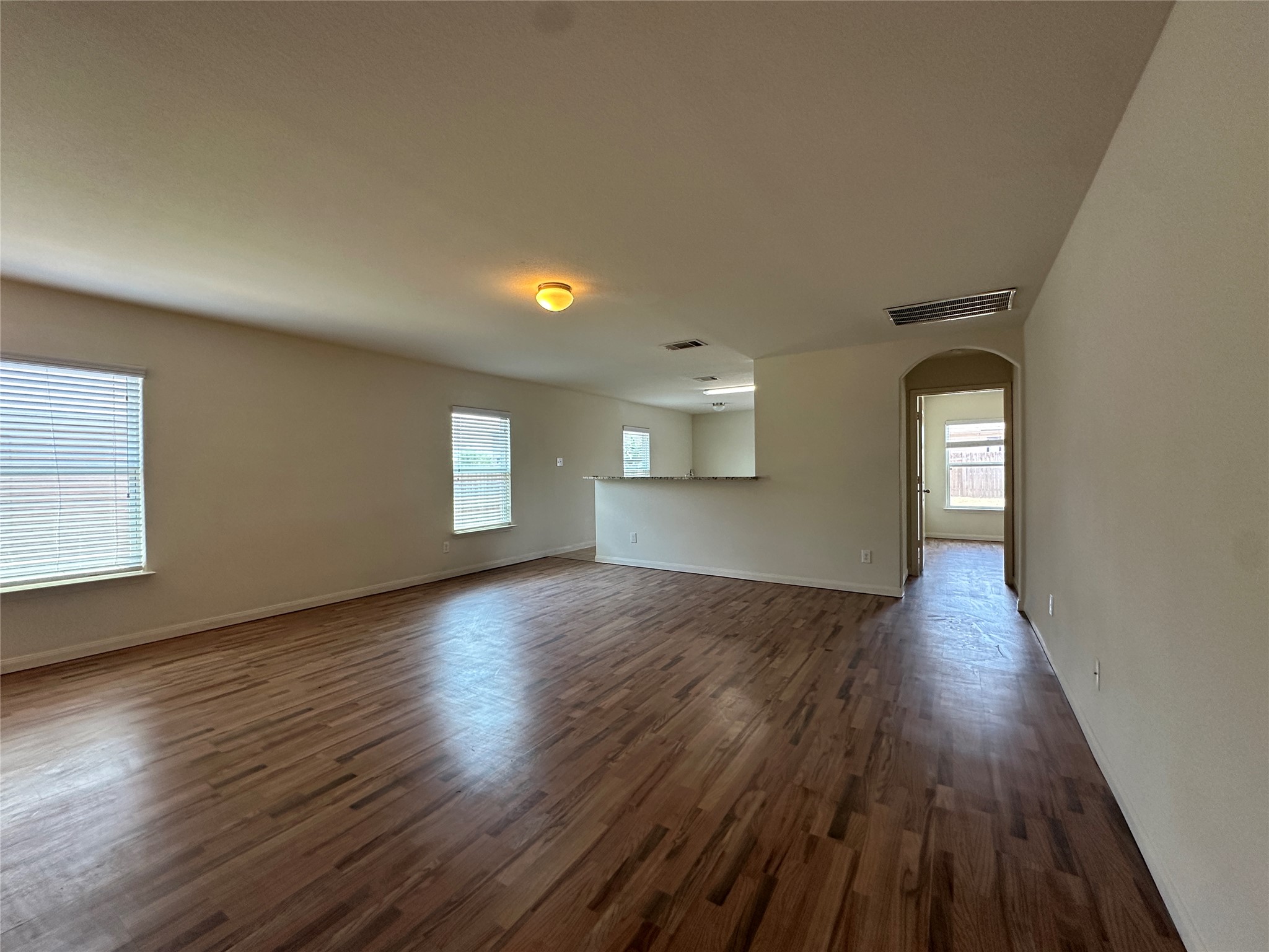 104 Millers Loop Jarrell, TX 76537 - Photo 3 of 11 The interior of the property features rich hardwood flooring throughout