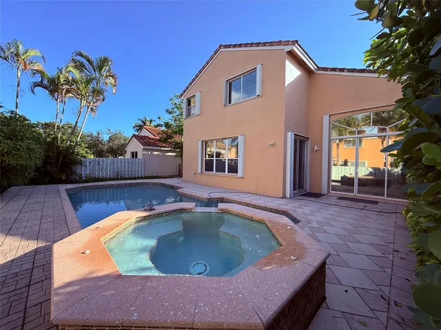 a view of outdoor space yard and swimming pool