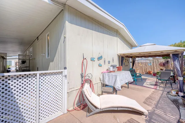 a outdoor space with lots of tables and chairs
