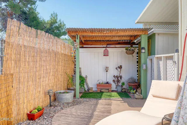 a view of a livingroom with furniture wooden floor and furniture