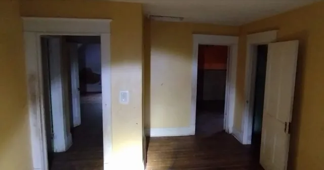 a view of an entryway and a floor to ceiling window