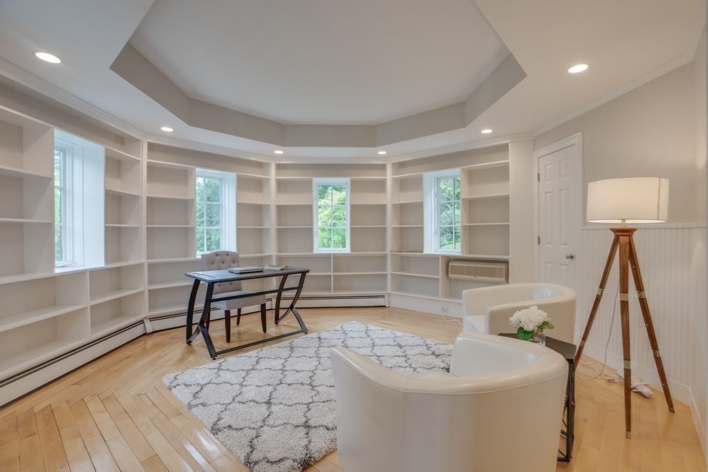 204 Pope Road Acton, MA 01720 - Photo 16 of 40 a view of a dining room with furniture window and wooden floor