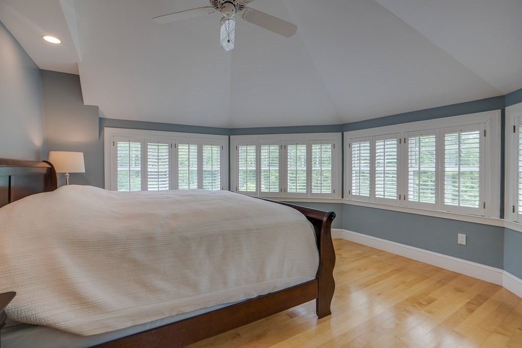 204 Pope Road Acton, MA 01720 - Photo 22 of 40 a bed sitting in a bedroom next to a window