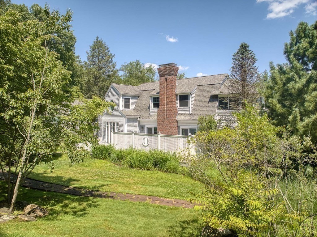 204 Pope Road Acton, MA 01720 - Photo 37 of 40 a front view of a house with yard and trees