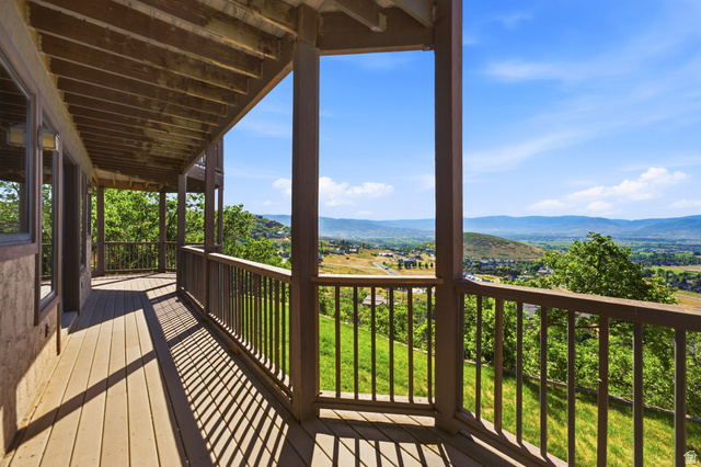335 Bern Way Midway, UT 84049 - Photo 54 of 88 Expansive outdoor balcony featuring a wood-finish deck and structural columns