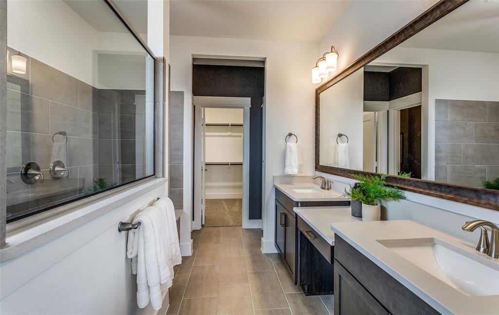 1701 Grace Street Anna, TX 75409 - Photo 6 of 10 a bathroom with a double vanity sink and a mirror