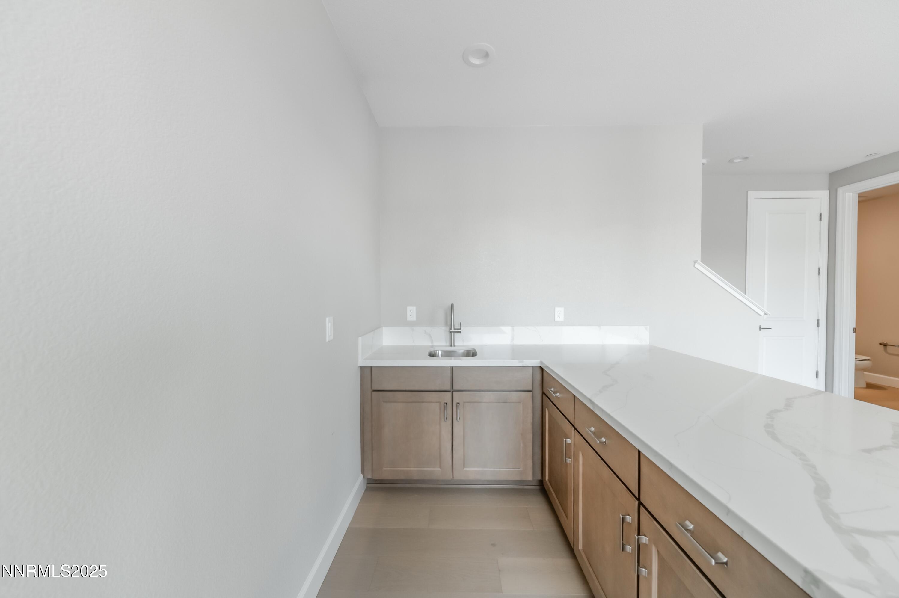 1513 Golf Club Drive Reno, NV 89519 - Photo 20 of 34 a kitchen with a sink and cabinets