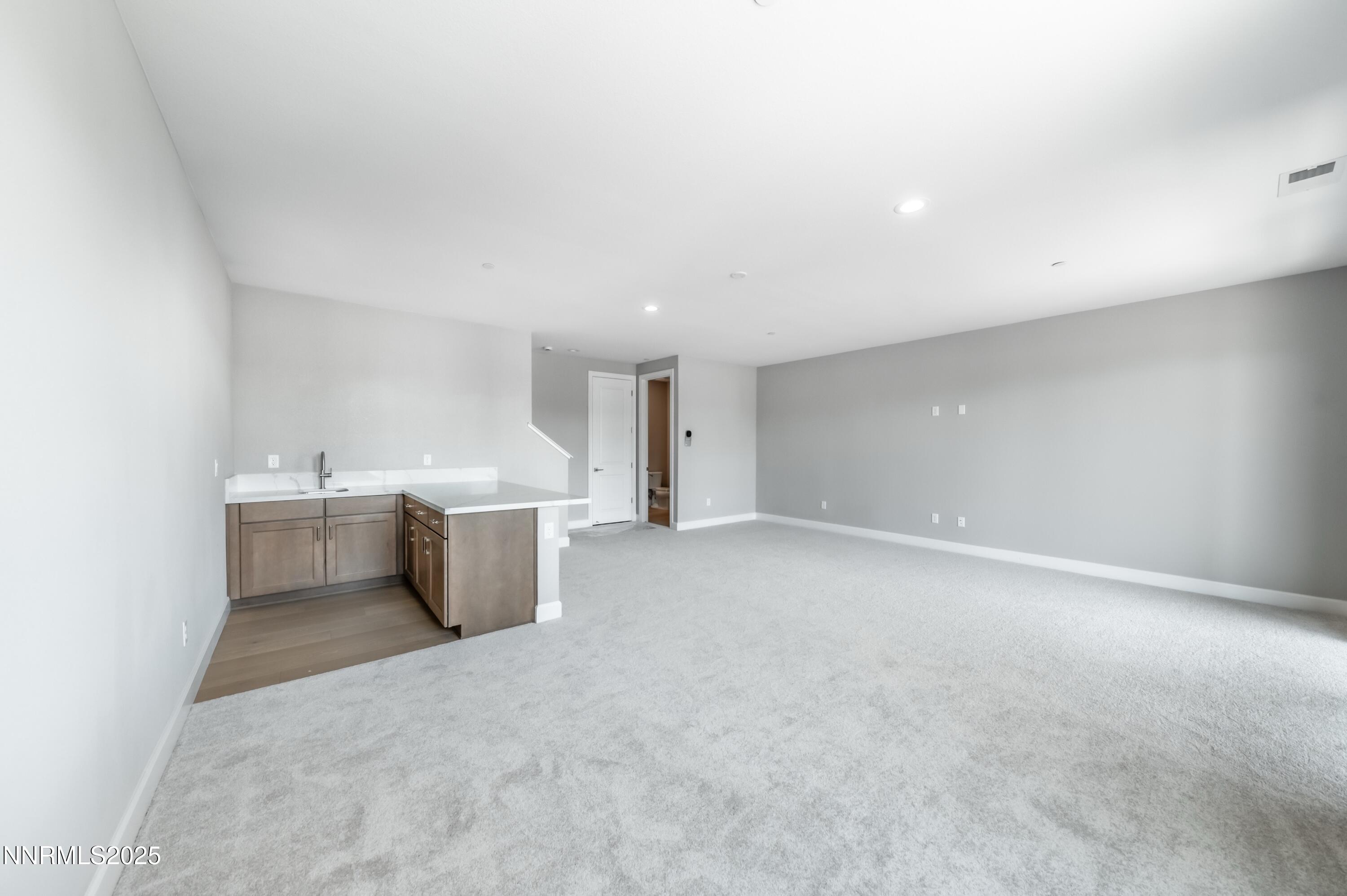 1513 Golf Club Drive Reno, NV 89519 - Photo 21 of 34 a view of a kitchen with a sink and a dishwasher