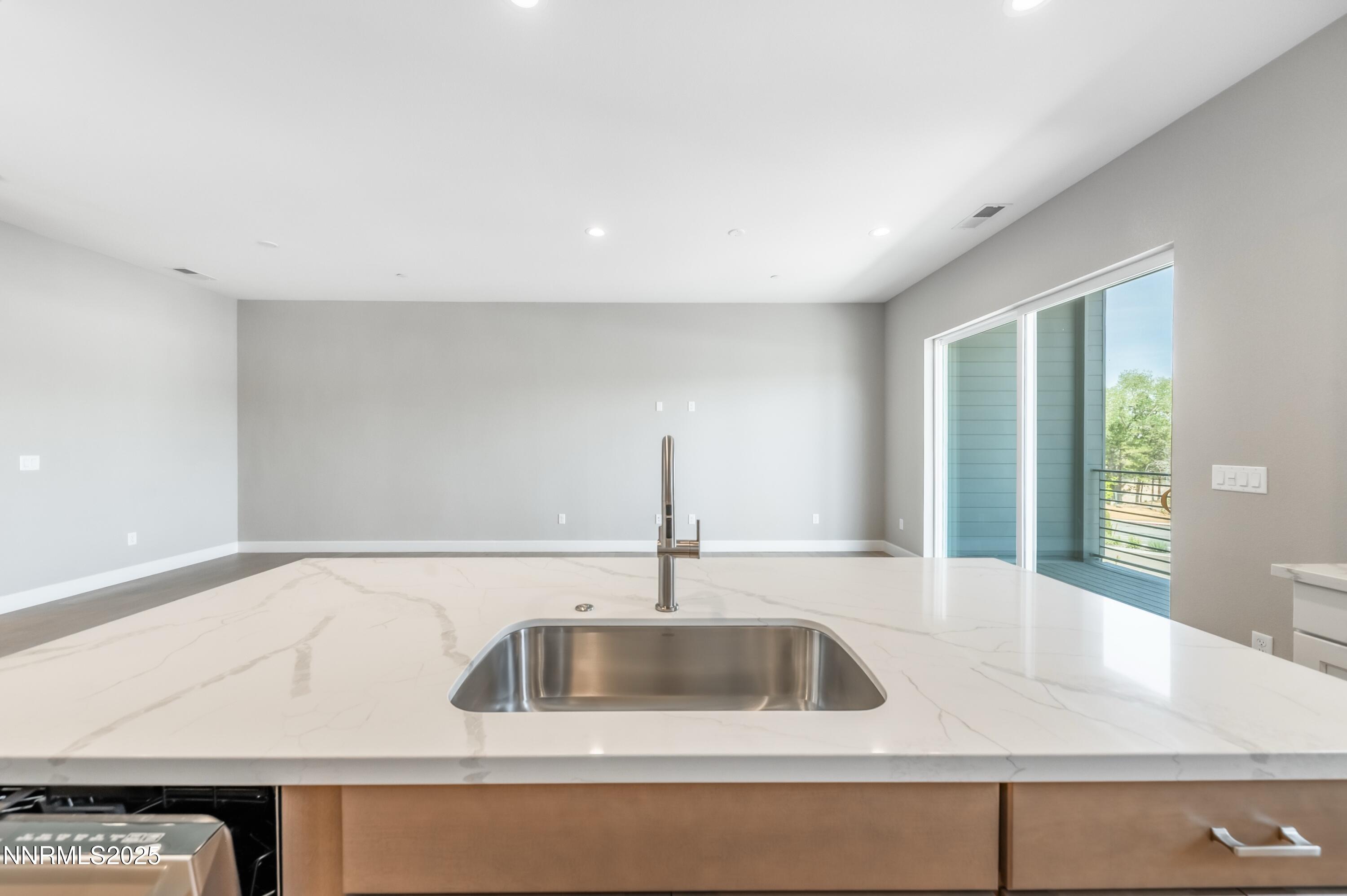 1513 Golf Club Drive Reno, NV 89519 - Photo 27 of 34 a kitchen with a sink and large window