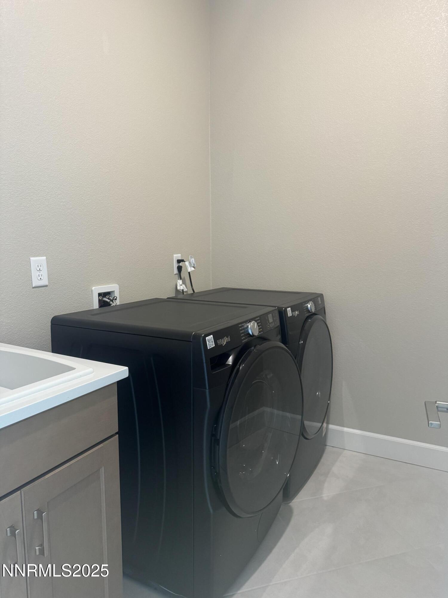 1513 Golf Club Drive Reno, NV 89519 - Photo 34 of 34 a utility room with dryer and washer
