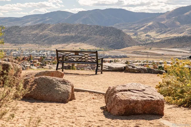 a view of a building with a mountain