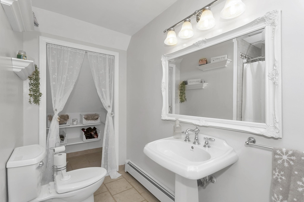 21 Brentwood Street Springfield, MA 01108 - Photo 27 of 41 a bathroom with a sink toilet and shower