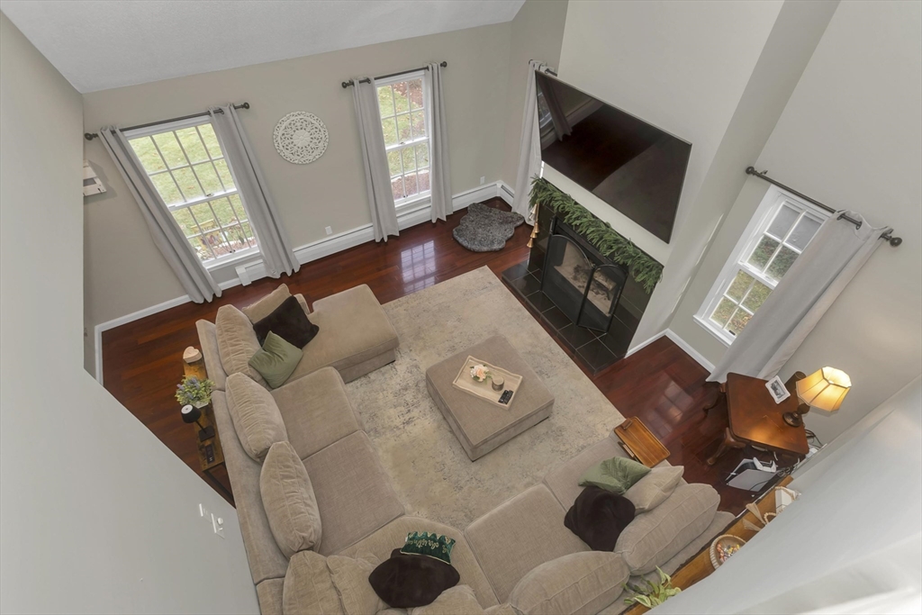 21 Brentwood Street Springfield, MA 01108 - Photo 8 of 41 a living room with furniture and a flat screen tv
