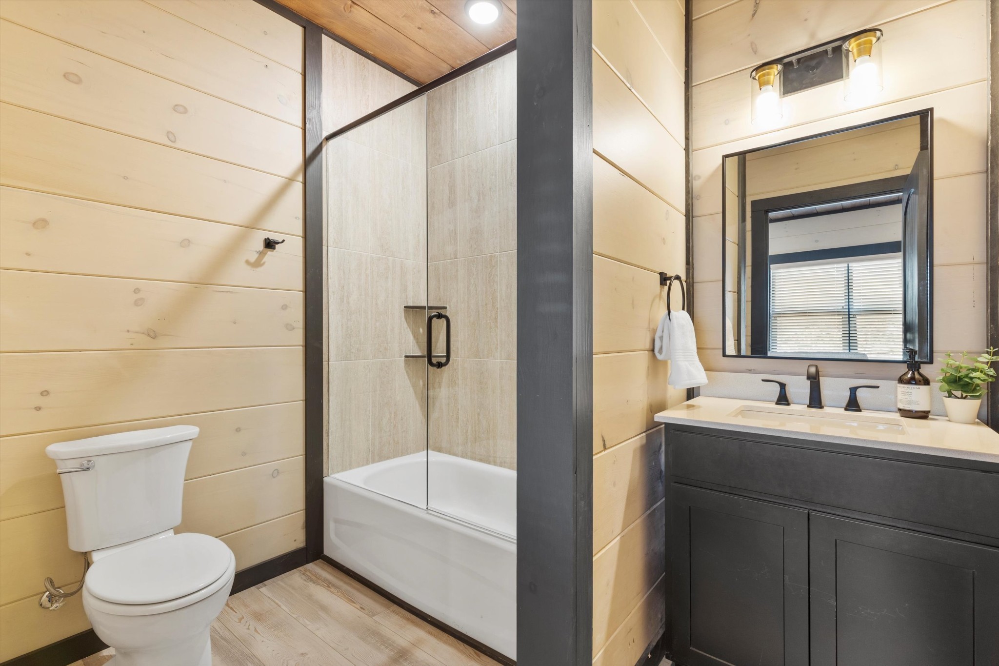 332 Rambling Creek Way Sevierville, TN 37862 - Photo 18 of 54 a bathroom with a sink a toilet and shower