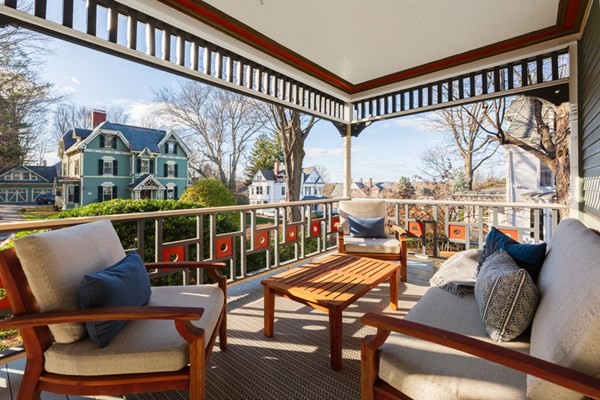 44 Putnam Street Newton, MA 02465 - Photo 2 of 24 a view of a balcony with furniture