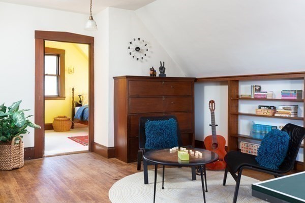 44 Putnam Street Newton, MA 02465 - Photo 22 of 24 a living room with furniture and wooden floor