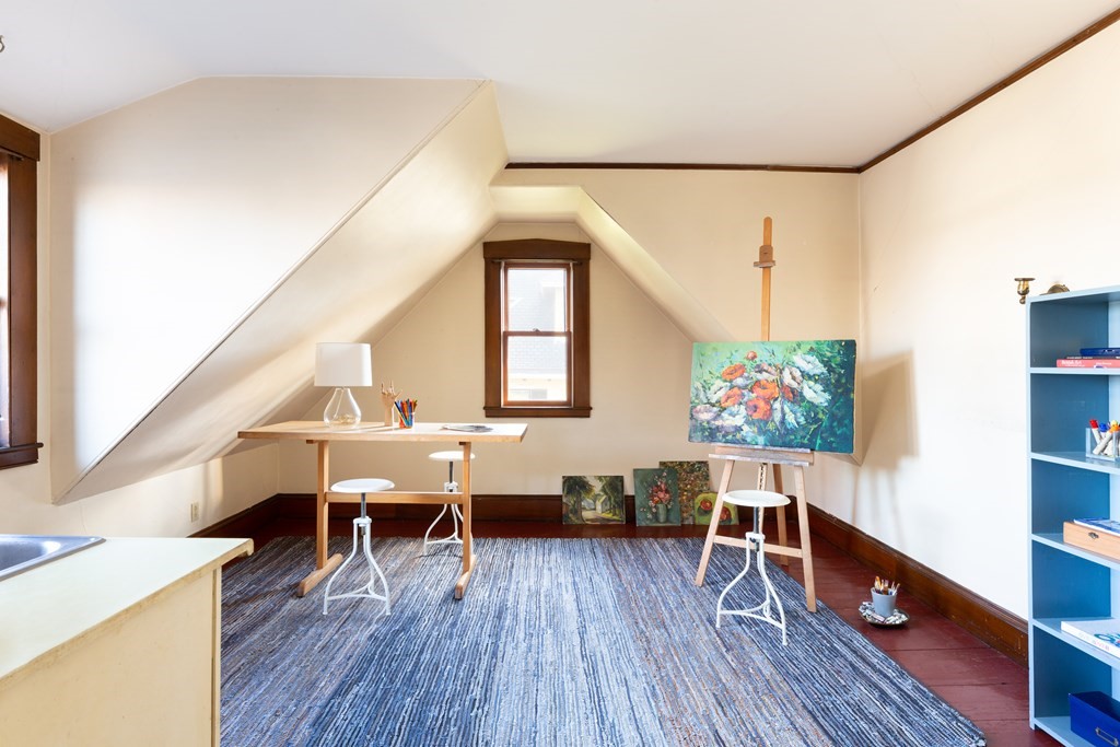 44 Putnam Street Newton, MA 02465 - Photo 24 of 24 a living room with furniture and a wooden floor