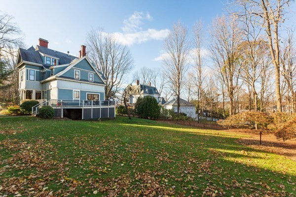 44 Putnam Street Newton, MA 02465 - Photo 5 of 24 a front view of house with yard and trees all around