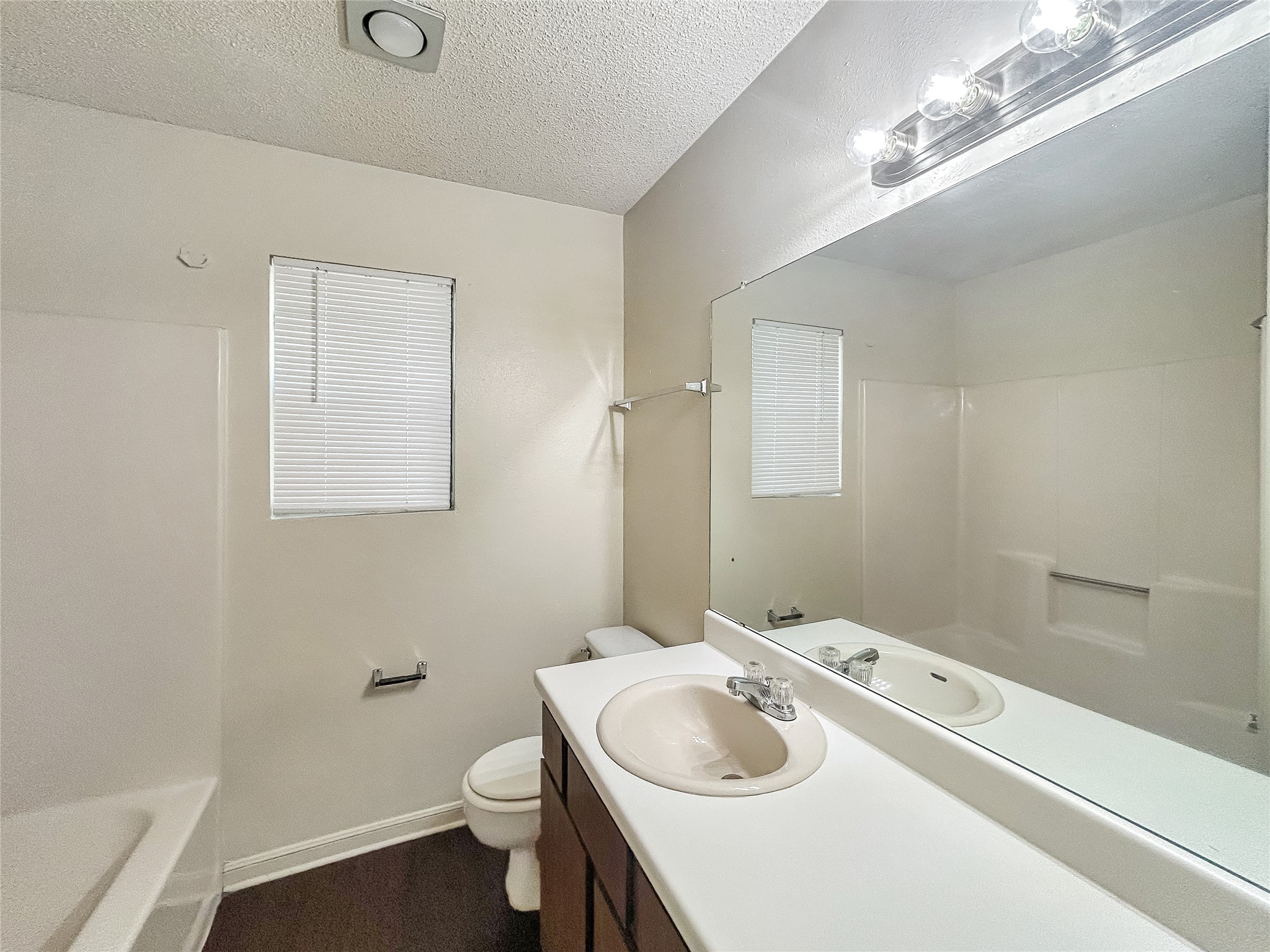 2008 Alex Avenue, Unit A Austin, TX 78728 - Photo 8 of 22 Primary Bathroom with Vanity Sink and Combined Shower and Tub