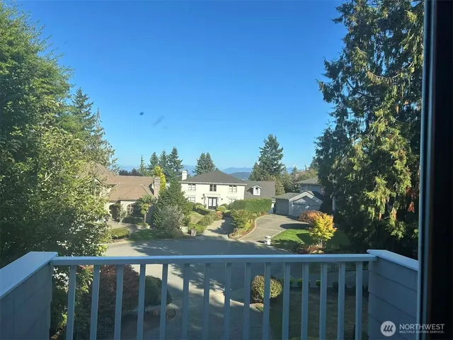 a view of a city skyline from a balcony