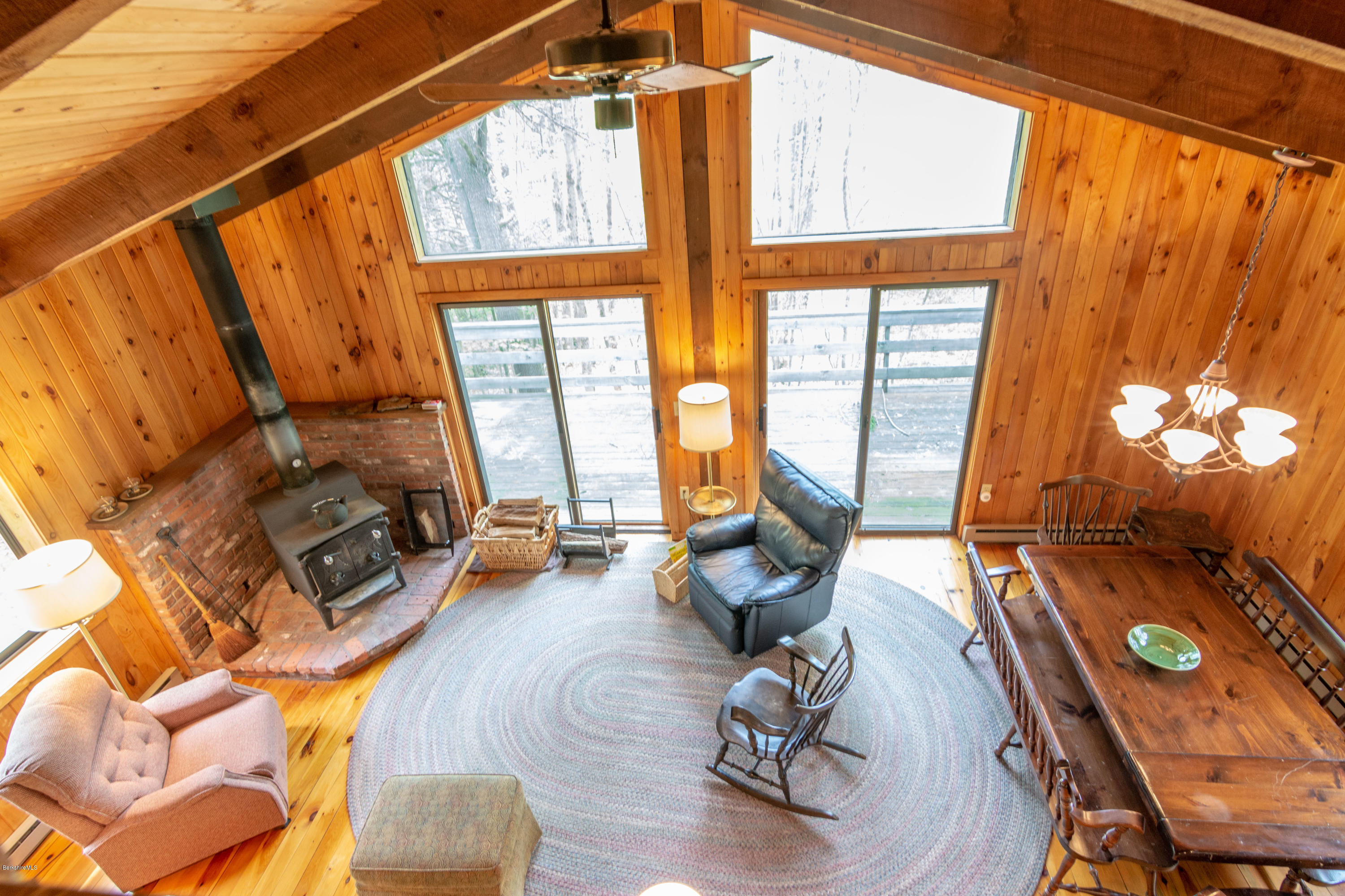 673 West Center Road Otis, MA 01253 - Photo 12 of 23 a living room with furniture and a large window