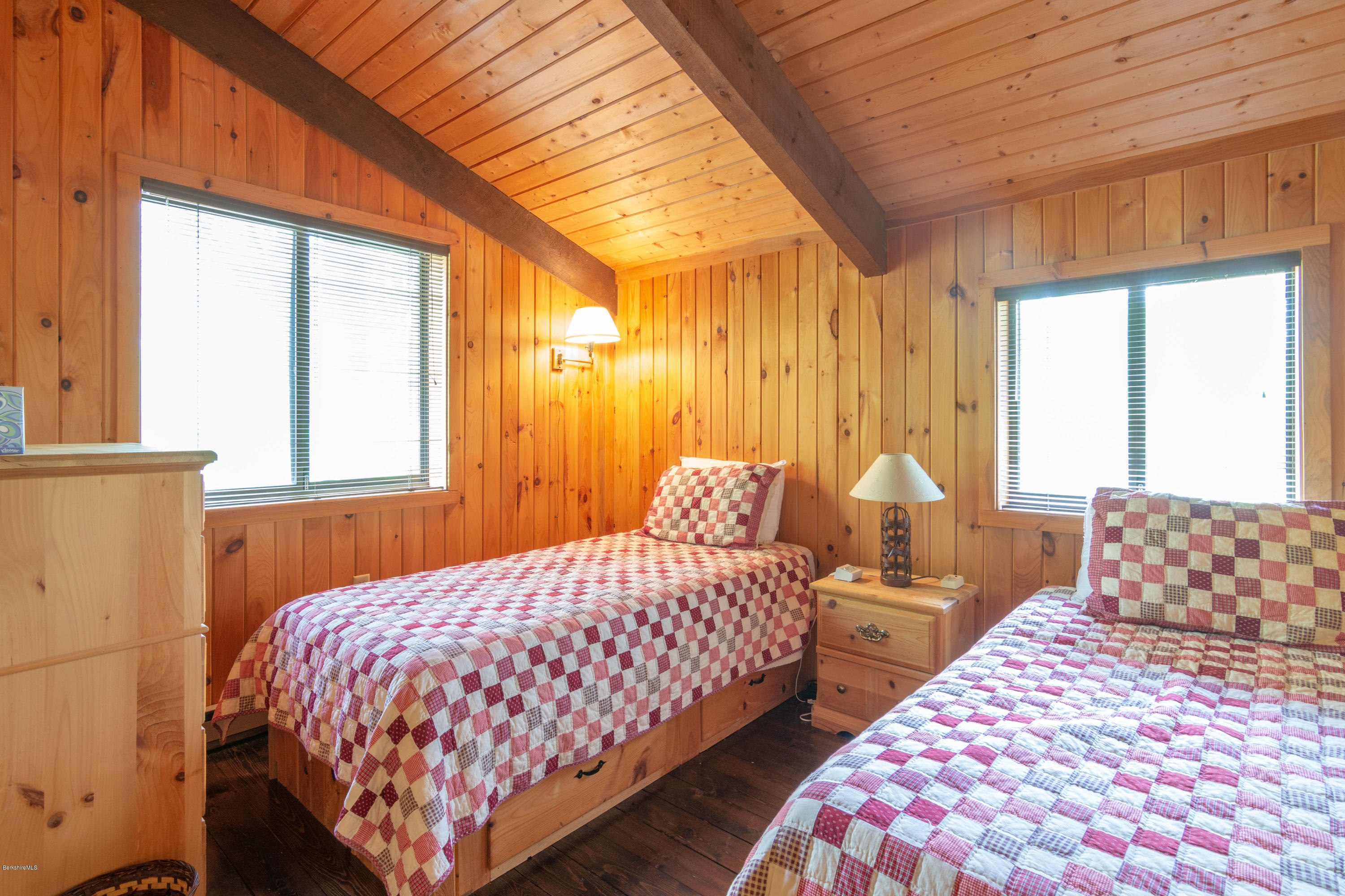673 West Center Road Otis, MA 01253 - Photo 15 of 23 a bedroom with two beds and next to a window