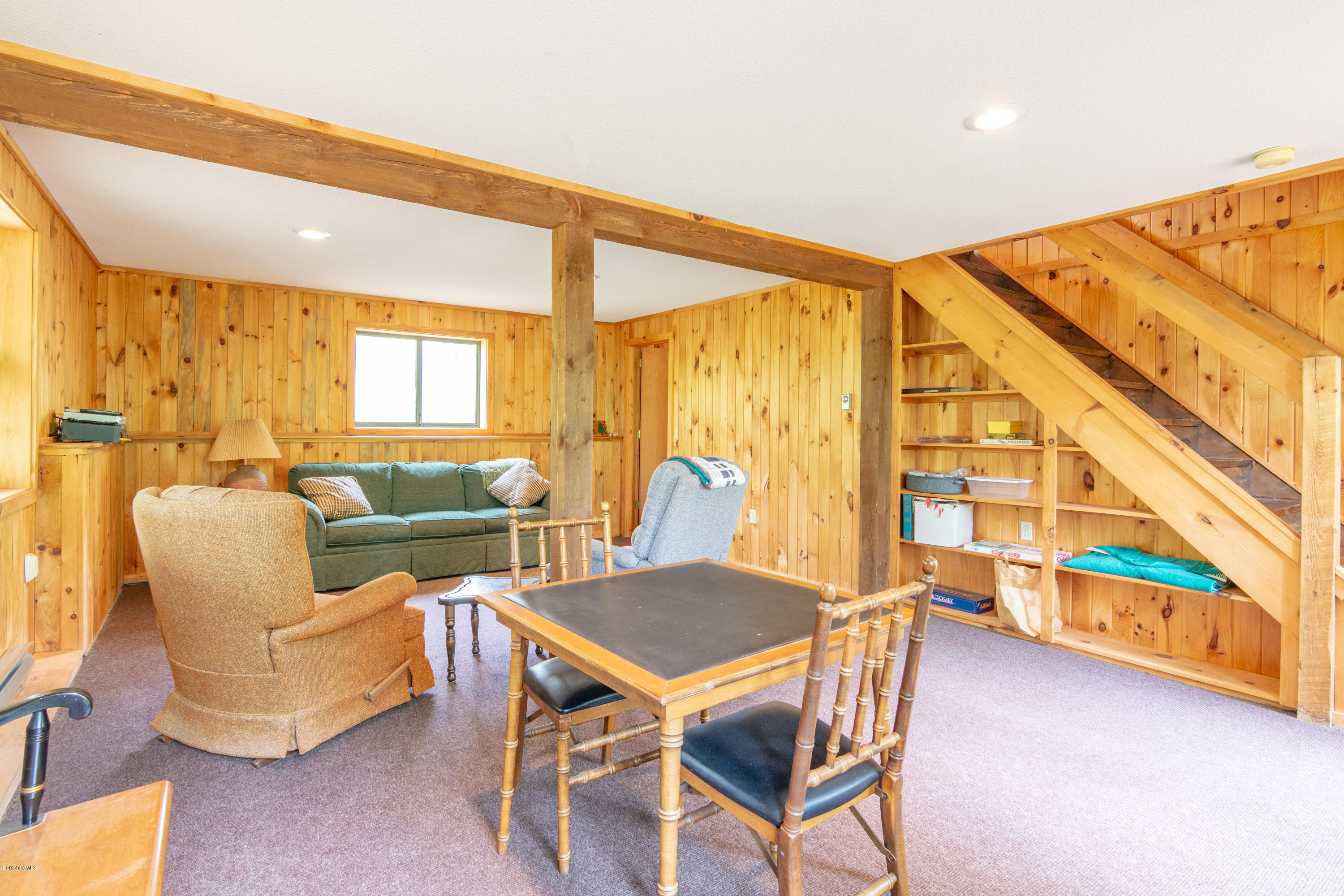 673 West Center Road Otis, MA 01253 - Photo 18 of 23 a view of a dining room with furniture and chandelier