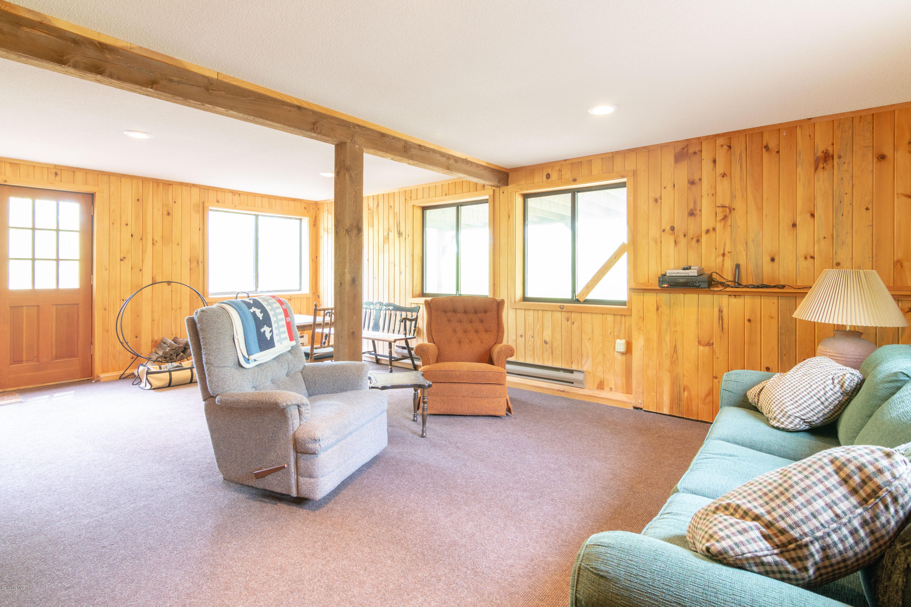 673 West Center Road Otis, MA 01253 - Photo 19 of 23 a living room with furniture and a large window