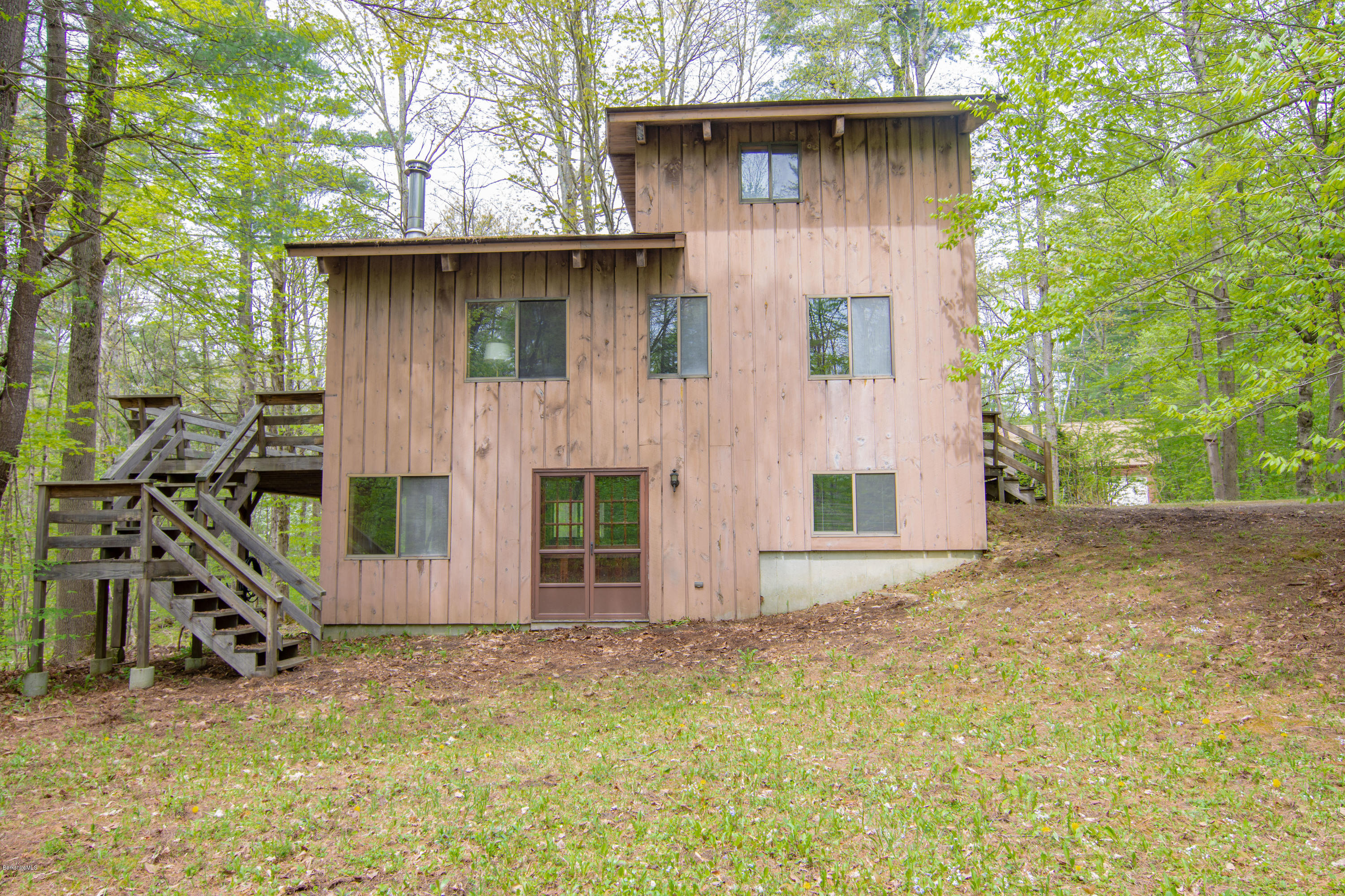 673 West Center Road Otis, MA 01253 - Photo 22 of 23 a view of a house with a yard
