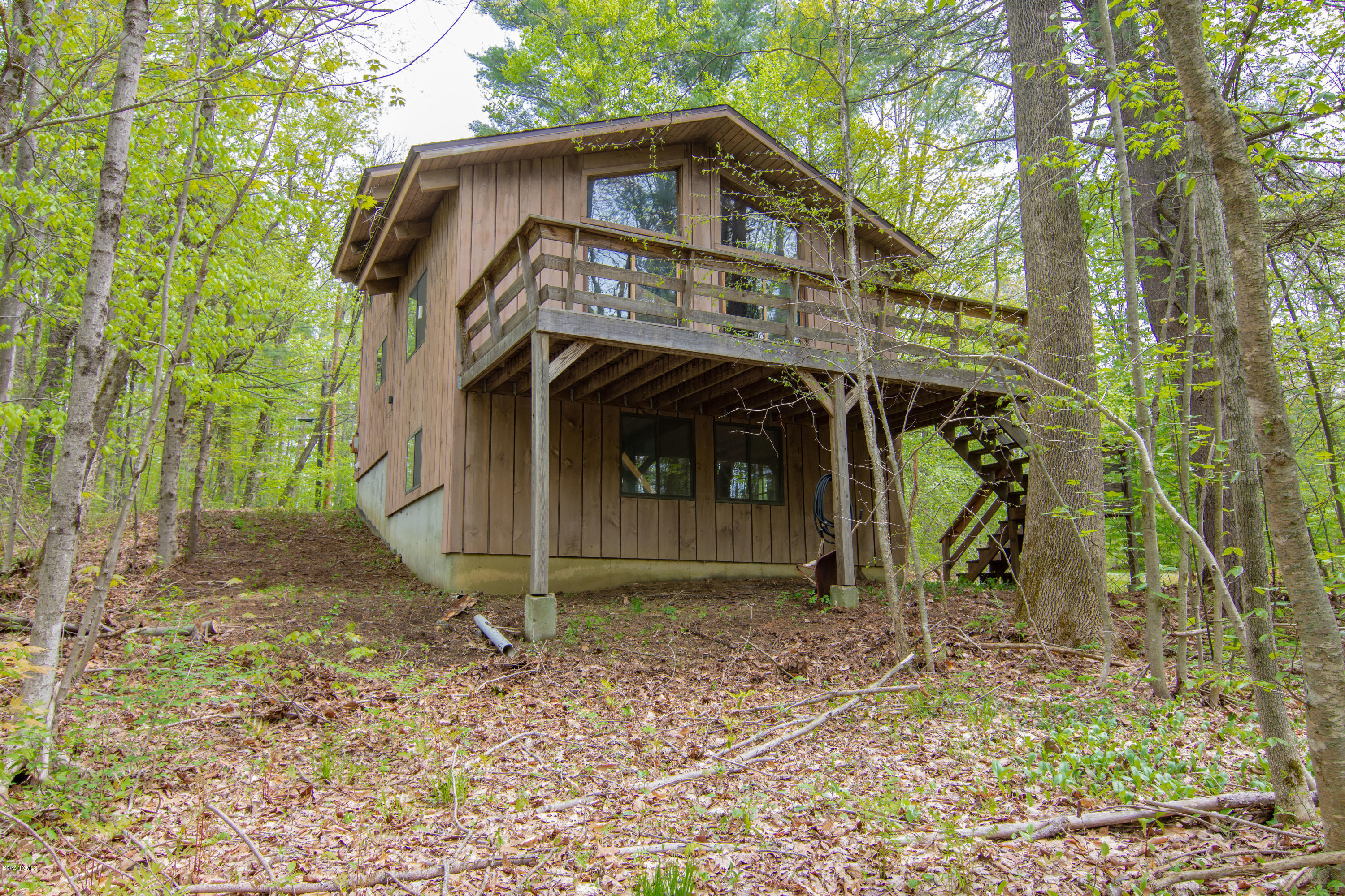 673 West Center Road Otis, MA 01253 - Photo 23 of 23 a front view of a house with a yard