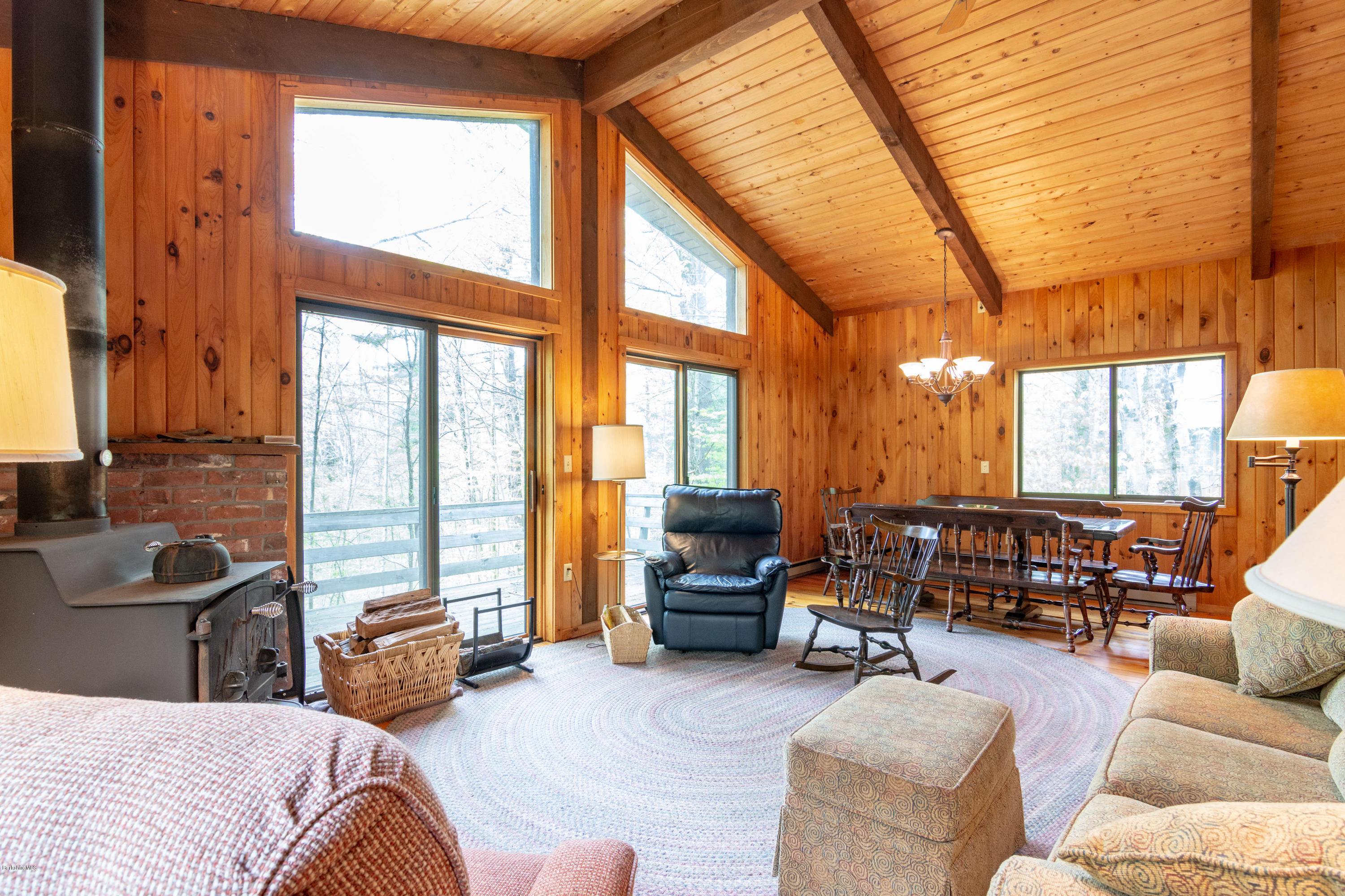 673 West Center Road Otis, MA 01253 - Photo 6 of 23 a living room with furniture and large windows