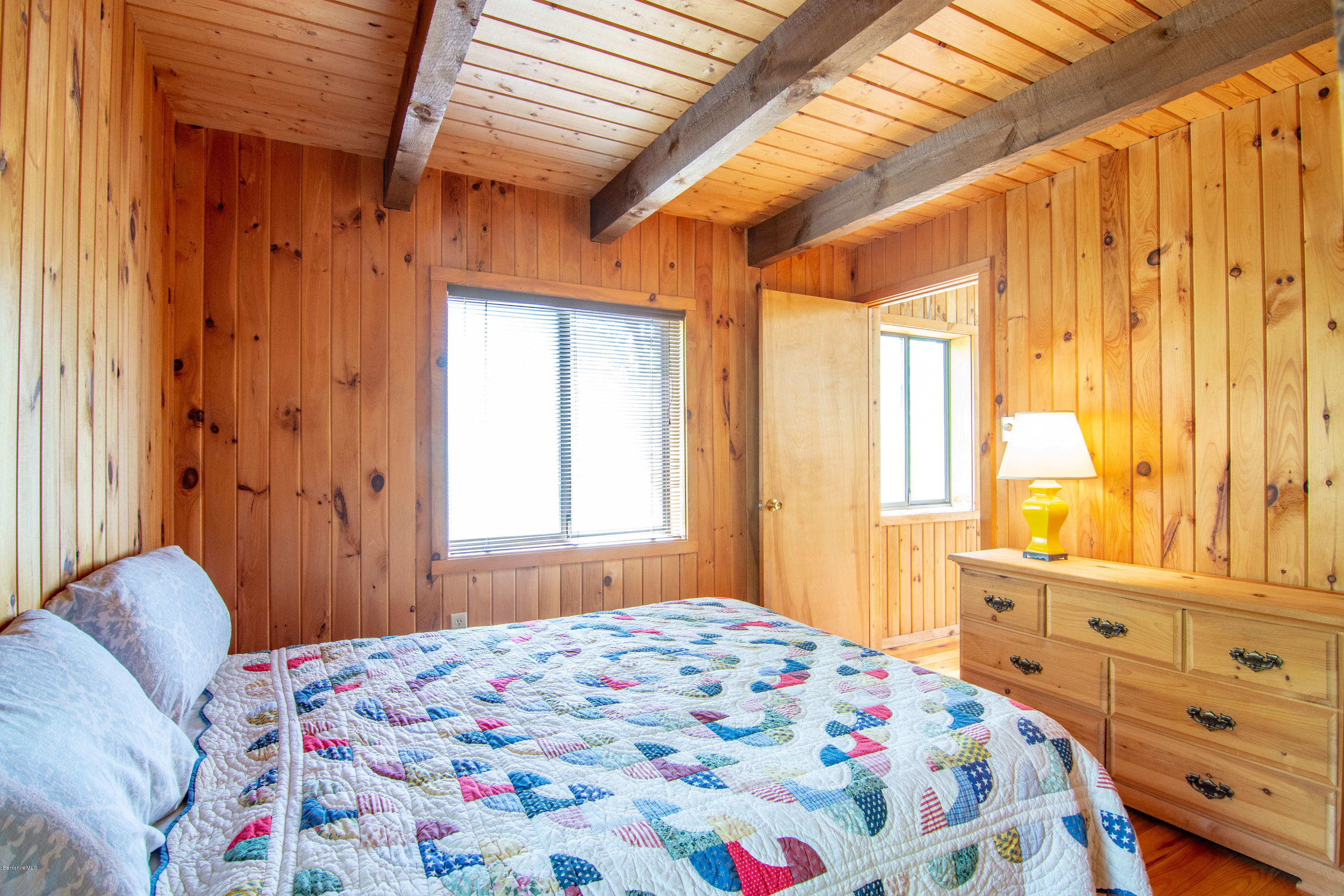 673 West Center Road Otis, MA 01253 - Photo 10 of 23 a bedroom with a bed and a window