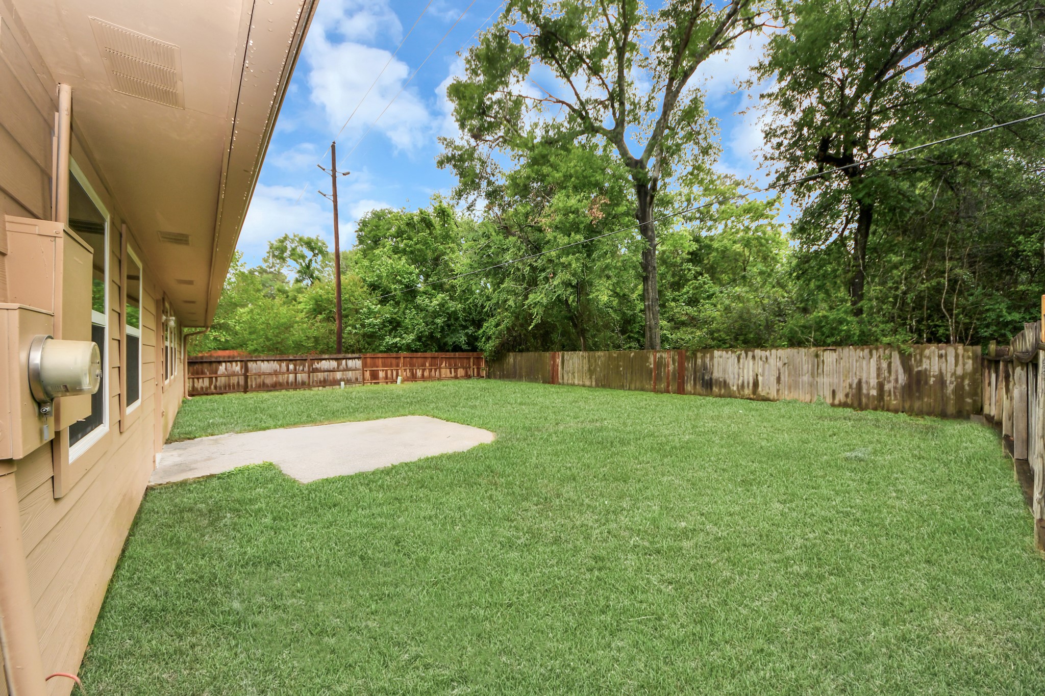 6603 Brookgate Drive Spring, TX 77373 - Photo 20 of 22 a view of a backyard