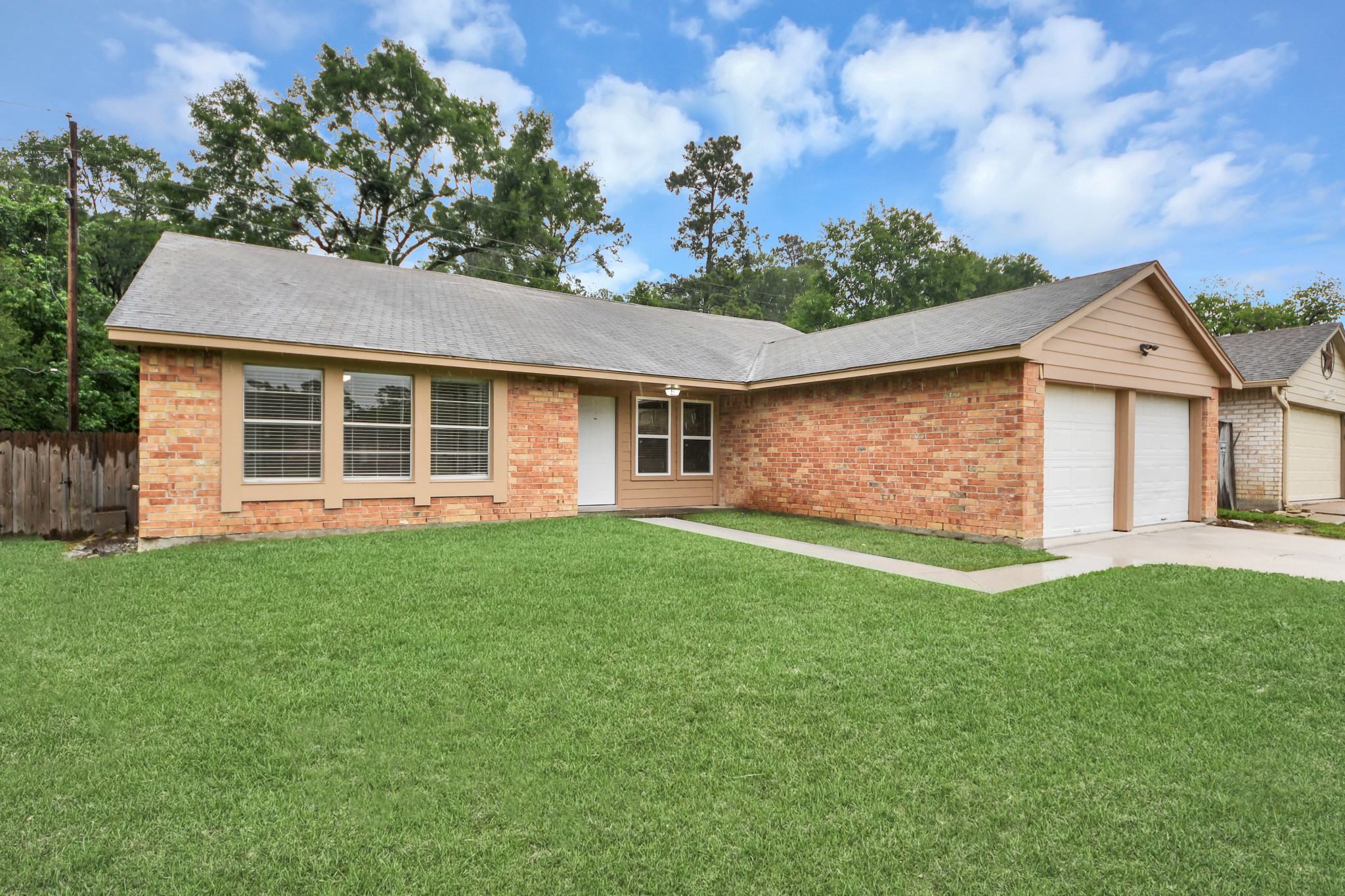 6603 Brookgate Drive Spring, TX 77373 - Photo 21 of 22 front view of a house with a yard