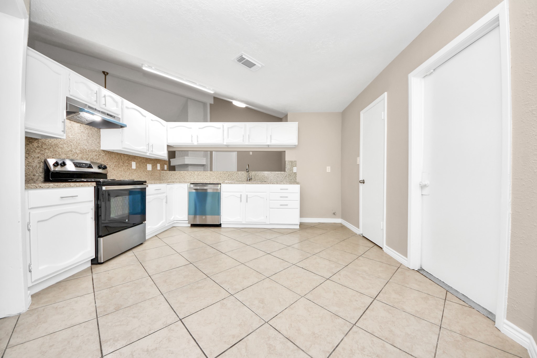 6603 Brookgate Drive Spring, TX 77373 - Photo 9 of 22 a view of a kitchen with electric appliances
