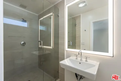 a bathroom with a toilet and a sink