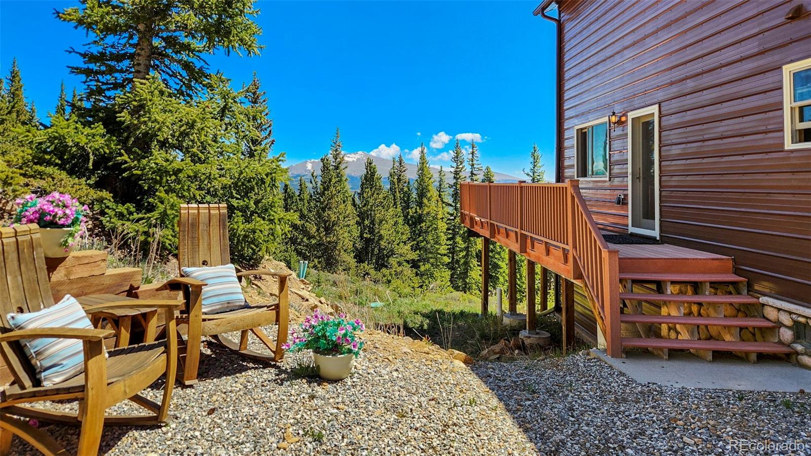 378 Silver Heels Circle Fairplay, CO 80440 - Photo 23 of 40 a view of a patio with table and chairs and potted plants