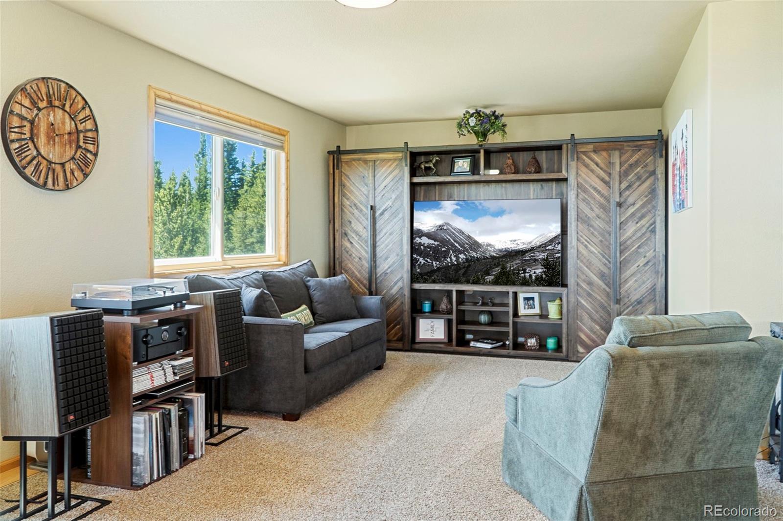 378 Silver Heels Circle Fairplay, CO 80440 - Photo 31 of 40 a living room with furniture a rug and a window