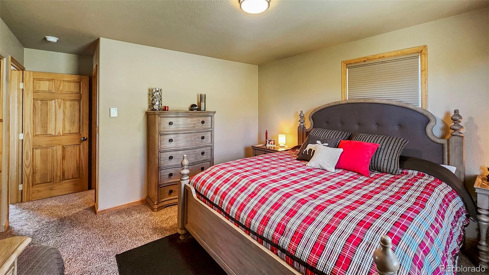 378 Silver Heels Circle Fairplay, CO 80440 - Photo 33 of 40 a bedroom with a bed and a closet