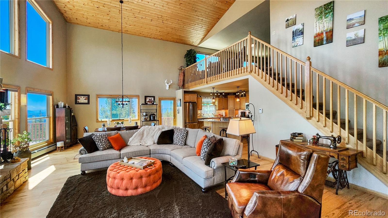 378 Silver Heels Circle Fairplay, CO 80440 - Photo 7 of 40 a living room with furniture fireplace and a table