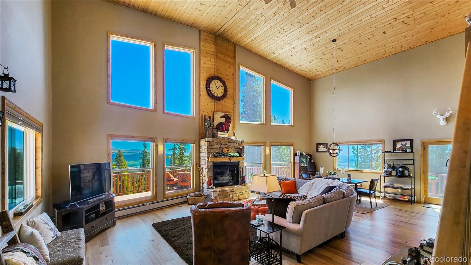 378 Silver Heels Circle Fairplay, CO 80440 - Photo 8 of 40 a living room with fireplace furniture and a flat screen tv