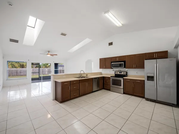 a large kitchen with a cabinets and counter space