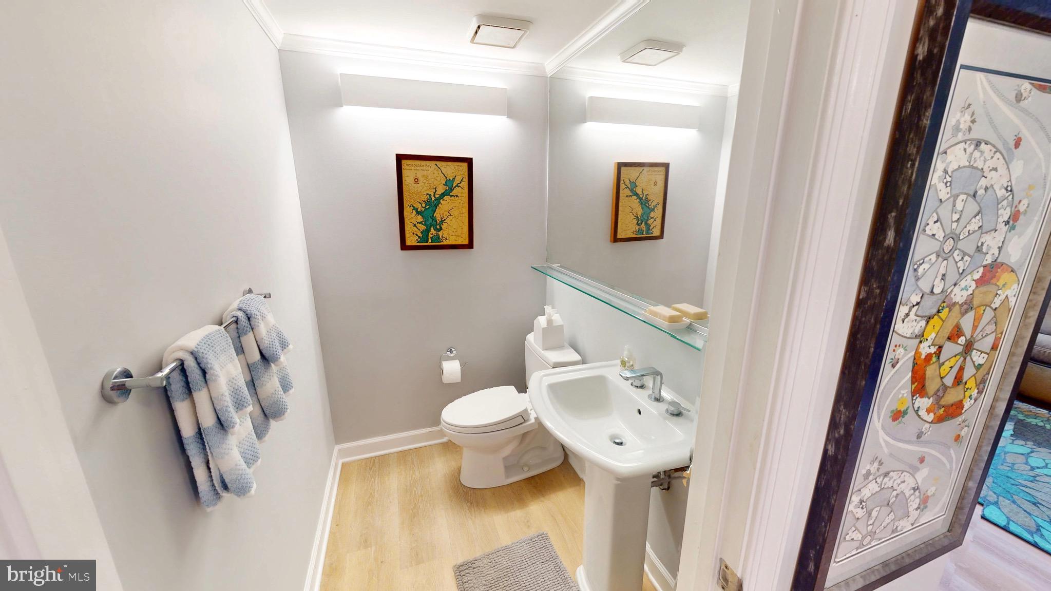 960 Fell Street, Unit 609 Baltimore, MD 21231 - Photo 34 of 45 a bathroom with a sink and toilet