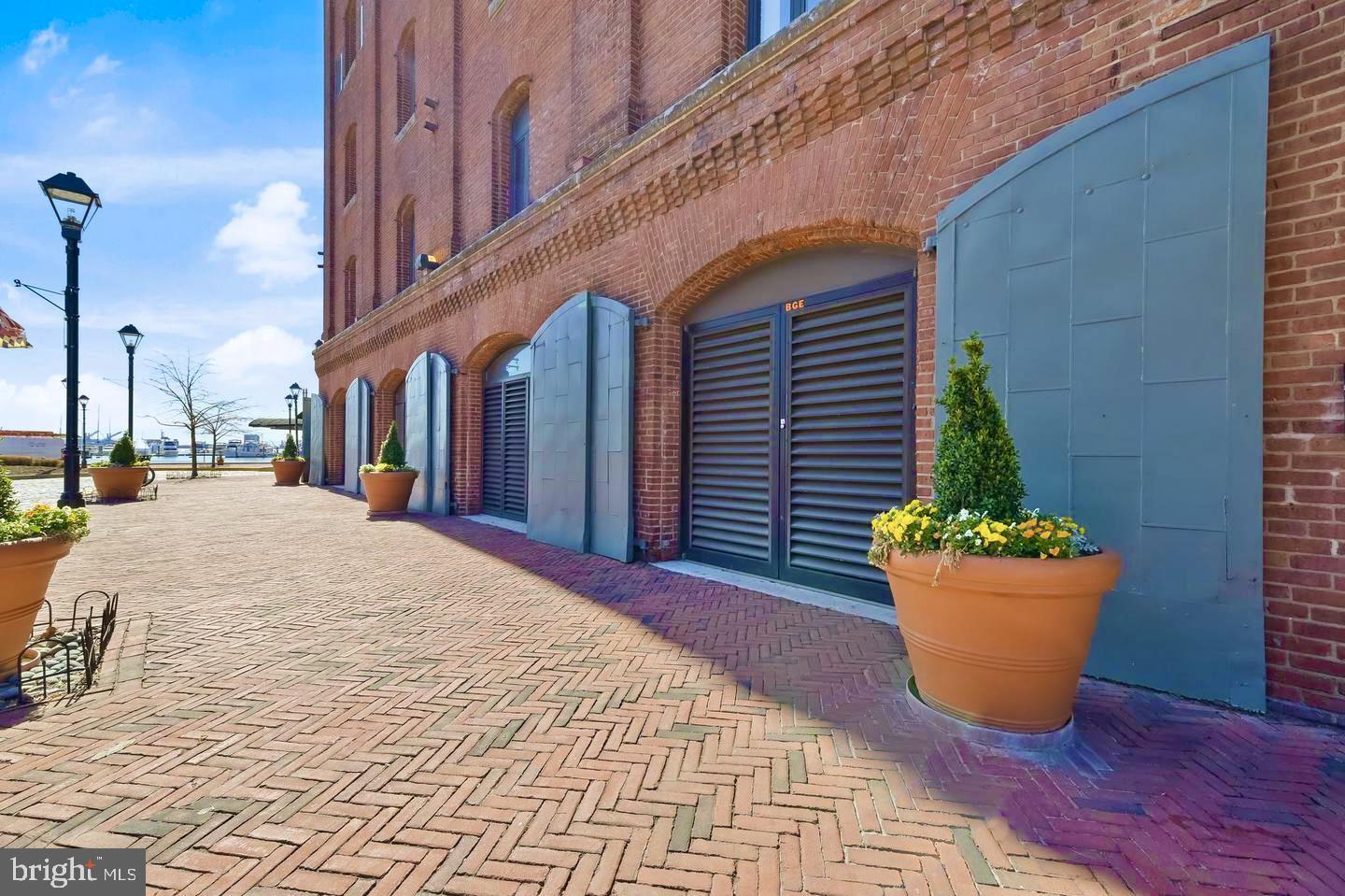 960 Fell Street, Unit 609 Baltimore, MD 21231 - Photo 41 of 45 a view of a building with potted plants