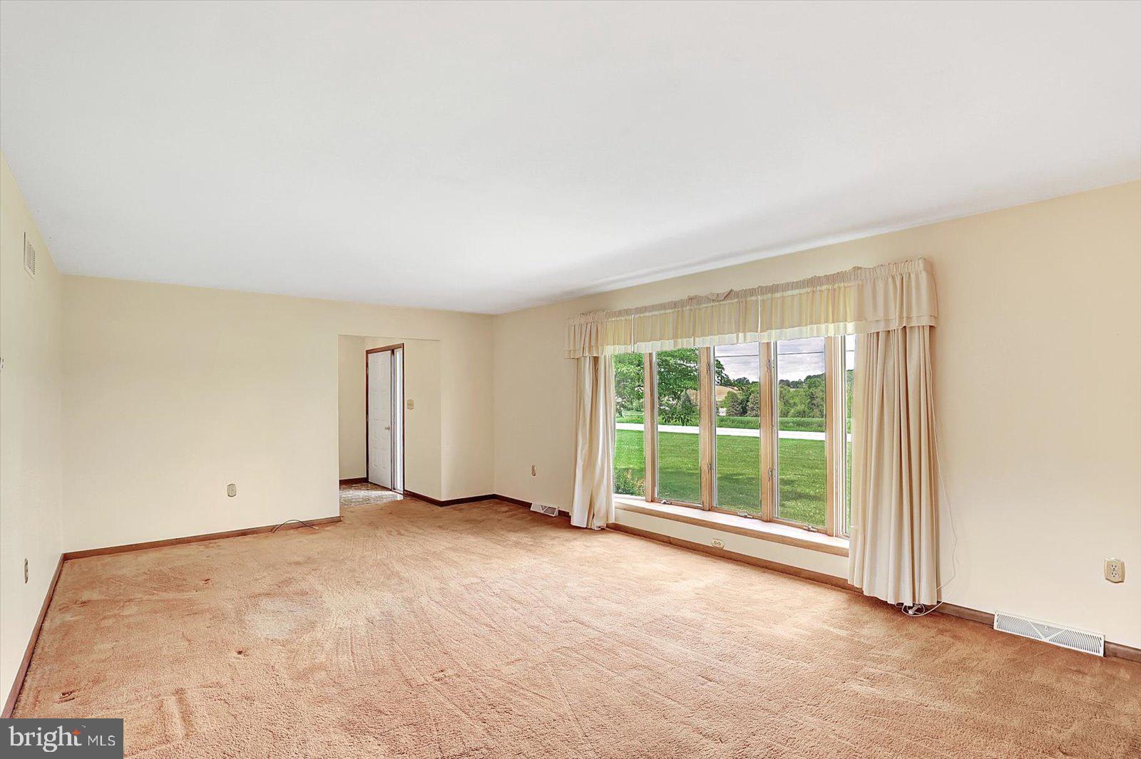 7112 Church Road Felton, PA 17322 - Photo 10 of 34 an empty room with large window