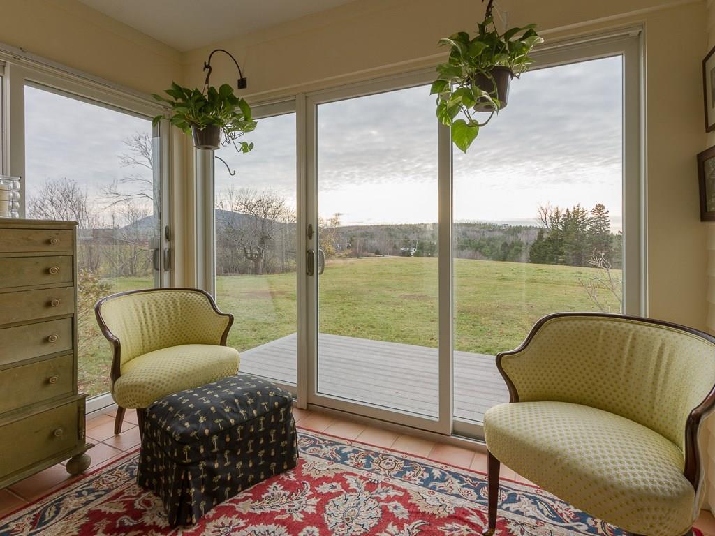 44 Youngs Mountain Road, Unit 2 Bar Harbor, ME 04609 - Photo 14 of 35 3 season sun porch with tile floor